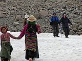 Tibet Kailash 09 Kora 12 Crossing Small Tongue of Ice We gingerly crossed the small tongue of ice on our descent from the D�lma La to the Eastern Valley floor. Easy does it for the Westerners, skip on by for the Pilgrims.